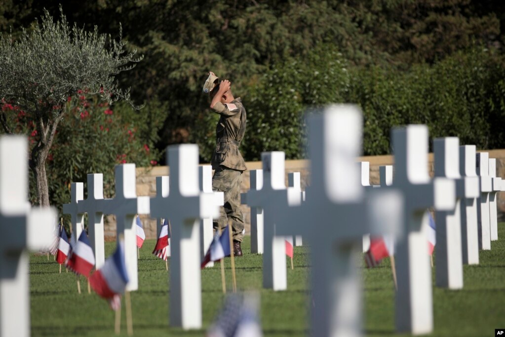 A soldier attends a ceremony at the Rhone American Cemetery in Draguignan, southern France, as part of the events to mark the 75th anniversary of the Allied landings in the area during World War Two.