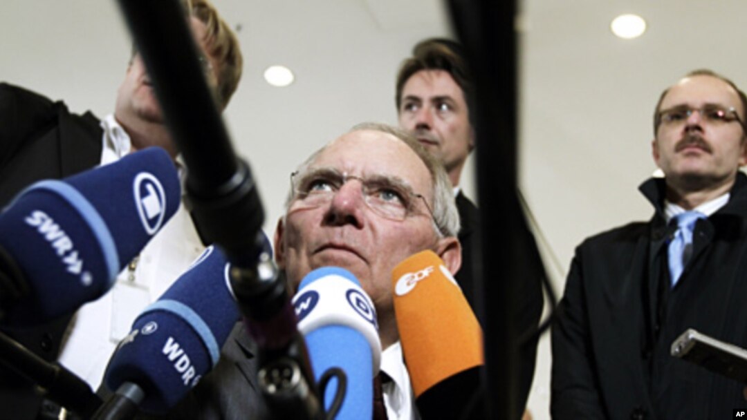 German Finance Minister Wolfgang Schaeuble speaks with the media prior to a meeting of eurozone finance ministers in Luxembourg, June 21, 2012 (AP).