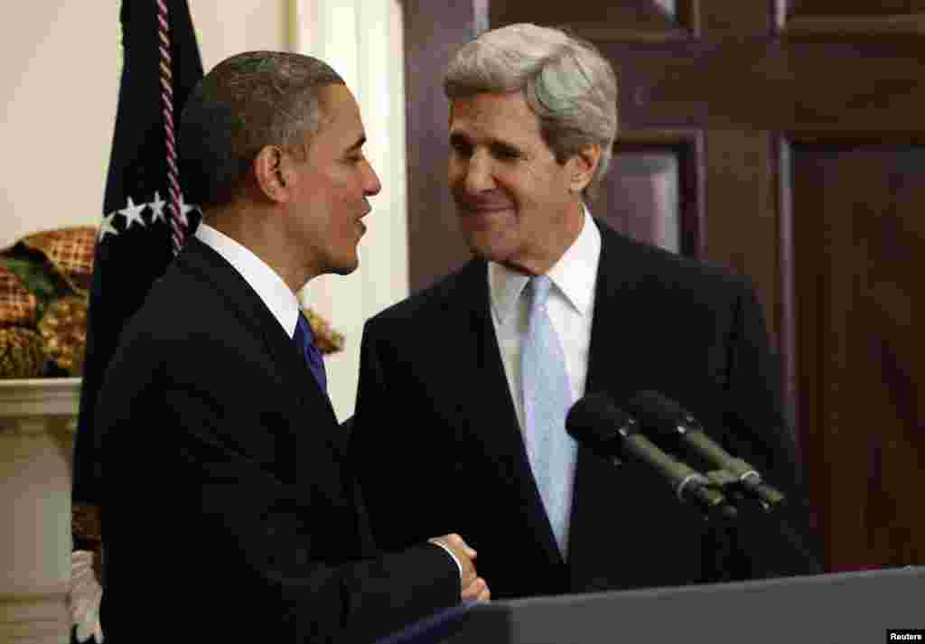 U.S. President Barack Obama (L) and Senator John Kerry (D-MA) shake hands after the president announced Kerry's nomination as Secretary of State to succeed Hillary Clinton, at the White House in Washington December 21, 2012. REUTERS/Kevin Lamarque (UNITED