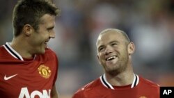 Tampil tanpa Wayne Rooney ((kanan) Manchester United kalah dua kali berturut-turut di kandang sendiri (foto: dok). 