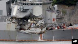 Damaged part of USS Fitzgerald is seen at the U.S. Naval base in Yokosuka, southwest of Tokyo, June 18, 2017. 