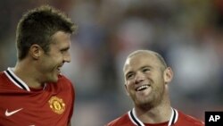 Wayne Rooney (dama) da Michael Carrick na kungiyar Manchester United