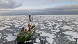 FILE - Greenpeace's Arctic Sunrise ship navigates through floating ice in the Arctic Ocean, Sept. 15, 2020.