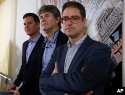 From left, Juan Carlos Cruz, James Hamilton and Jose Andres Murillo meet reporters at the foreign press association in Rome, May 2, 2018. The three whistle-blowers of Chile's sex abuse scandal are urging Pope Francis to transform his apology for having discredited them into concrete action to end what they say is an "epidemic" of sex abuse and cover-up in the Catholic Church.