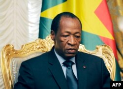 FILE - Burkina Faso President Blaise Compaore announced he was stepping down following violent protests demanding an end to his 27-year rule, Oct. 31, 2014.