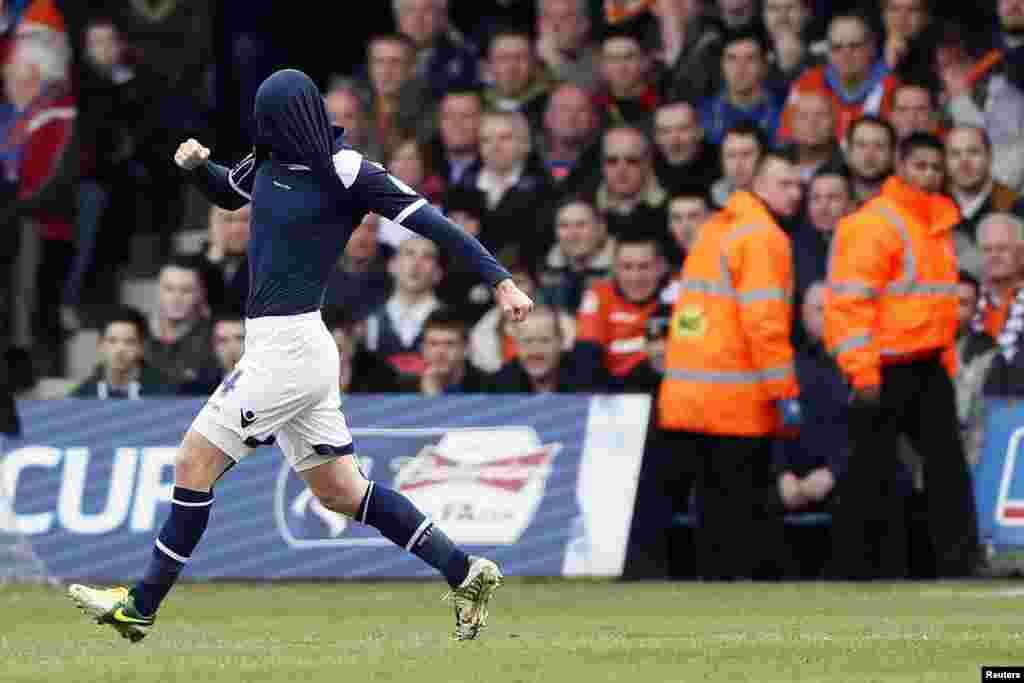 Millwall&#39;s James Henry celebrates after scoring against Luton Town during their FA Cup fifth round soccer match at Kenilworth Road in Luton, central England. 