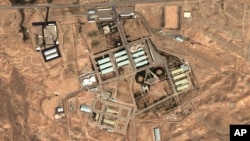 FILE - Satellite image provided by DigitalGlobe and the Institute for Science and International Security shows the military complex at Parchin, Iran, 30 kilometers (about 19 miles) southeast of Tehran.