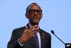 FILE - Rwanda's President Paul Kagame addresses the media during a press conference.