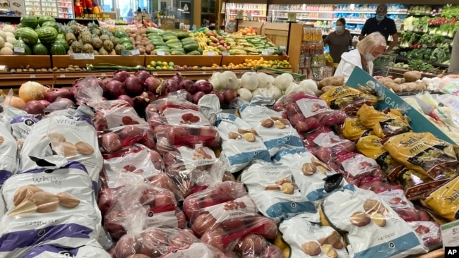 An assortment of potatoes are for sale in the produce section at a Publix Supermarket, Nov. 16, 2021 in North Miami, Fla.