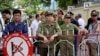 Vietnamese security officers set up a fence outside the Chinese Embassy, Hanoi, May 18, 2014.