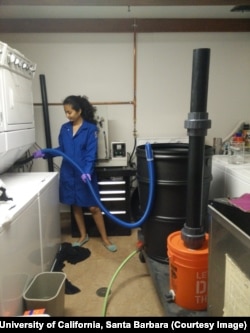 Masters student Shreya Sonar testing how much microfibers are released from Patagonia and other fleece materials during washing in washing machines at the University of California, Santa Barbara.