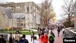 FILE - Students walk through the campus of Temple University in Philadelphia, Pennsylvania, Dec. 1, 2016. 