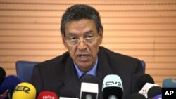 Moroccan Interior Minister Taieb Cherkaoui speaks during a news conference in Rabat, following last month's deadly cafe bombing in Marrakesh, May 6, 2011