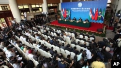 Leaders of the BRIC at the stage seated from left.,India's Prime Minister Manmohan Singh, Russia's President Dmitry Medvedev, China's President Hu Jintao, Brazil's President Dilma Rousseff, and South Africa's President Jacob Zuma attend a joint press conf