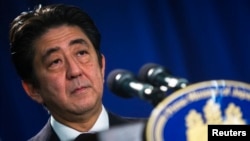 Japanese Prime Minister Shinzo Abe speaks at a news conference in New York, Sept. 27, 2013. 