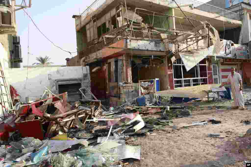 The aftermath of a car bomb attack in Karrada, Baghdad, Sept. 4, 2013.