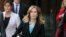 FILE - Actress Felicity Huffman departs federal court in Boston, April 3, 2019.