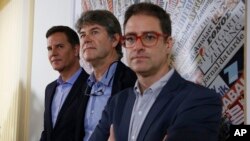 FILE - From left, Juan Carlos Cruz, James Hamilton and Jose Andres Murillo meet reporters at the foreign press association in Rome, May 2, 2018. They are all victims in Chile's sex abuse scandal.