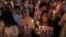 Members of the "White Shirt" movement hold a candlelight vigil to demand democratic elections and political reforms in Bangkok, Thailand, Jan. 24, 2014. 