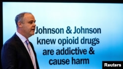 FILE - State's attorney Brad Beckworth presents information in the opening statements during the Oklahoma v. Johnson & Johnson opioid trial at the Cleveland County Courthouse in Norman, Oklahoma, May 28, 2019. 