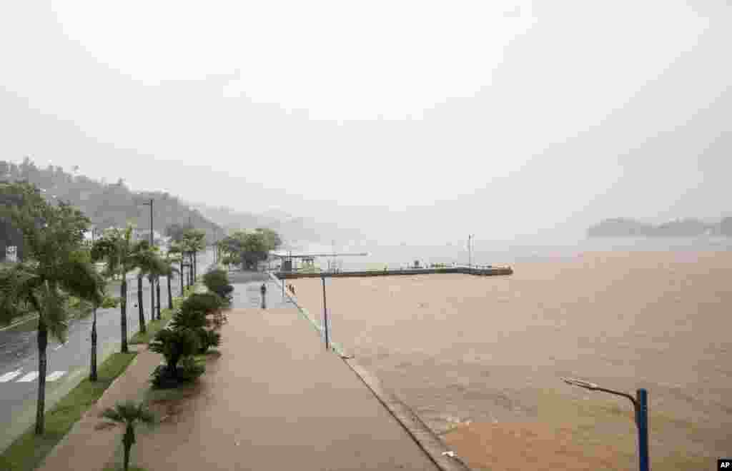 A man walks by the waterfront as Hurricane Irma approaches Samana, Dominican Republic, Sept. 7, 2017. 