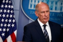 FILE - Director of National Intelligence Dan Coats at a briefing at the White House, Aug. 2, 2018. Coats warned the American public several times of Russian attempts to interfere in U.S. elections.