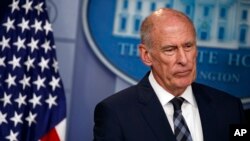 FILE - Director of National Intelligence Dan Coats is seen at a briefing at the White House, Aug. 2, 2018, in Washington.