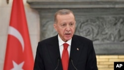 FILE - Turkey's President Recep Tayyip Erdogan at Maximos Mansion in Athens, Greece, on December 7, 2023. In a speech on December 9, 2023 he accused the West of “barbarism” for its stance on the Israel-Hamas war and what he alleged was its toleration of Islamophobia.