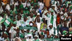 Nigeria fans celebrate after reaching the Africa Cup of Nations over South Africa, Bouake, Ivory Coast, February 7, 2024.