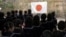 Students line up in front of Japan's national flag at the morning assembly at Tsukamoto kindergarten in Osaka, Japan, Nov. 30, 2016. 