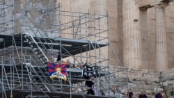 兩名被希臘警方扣反對北京冬奥會活動人士已獲釋