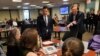 FILE - Department of Homeland Security (DHS) Acting Secretary Chad Wolf (L) and Cybersecurity and Infrastructure Security Agency (CISA) Director Christopher Krebs speak with election security experts in Arlington, Virginia, March 3, 2020.