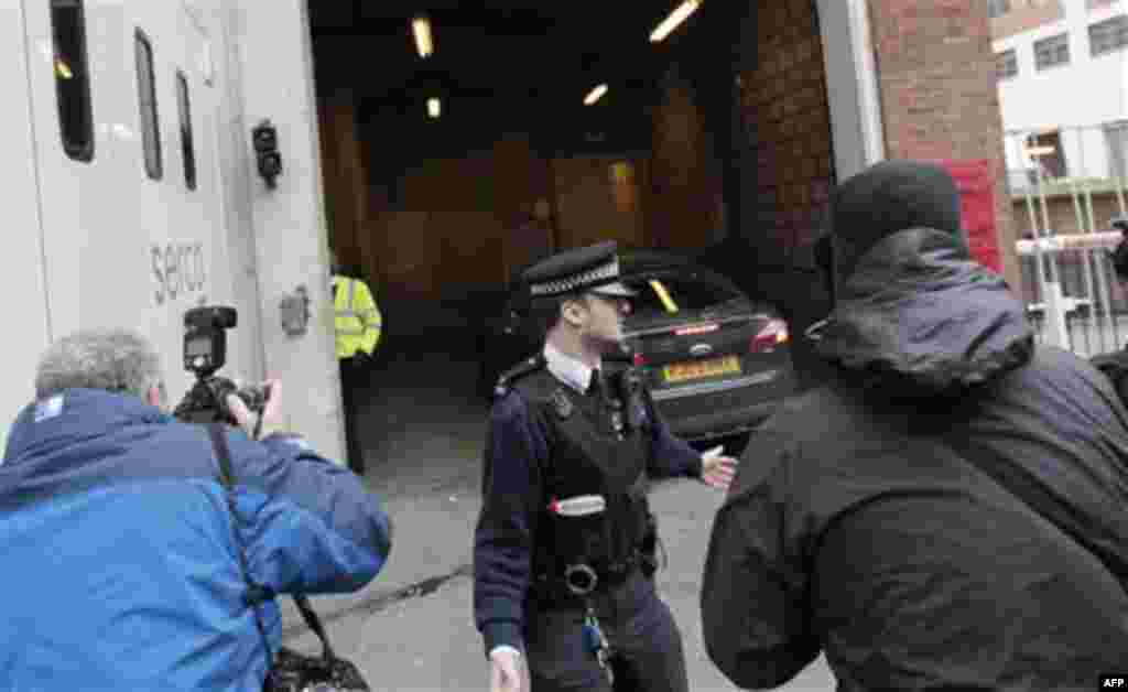 A car believed to carrying whistle-blowing website WikiLeaks founder Julian Assange arrives at City of Westminster Magistrates Court in London, Tuesday, Dec. 7, 2010. Julian Assange is appearing at the court for his extradition hearing for sexual assault 