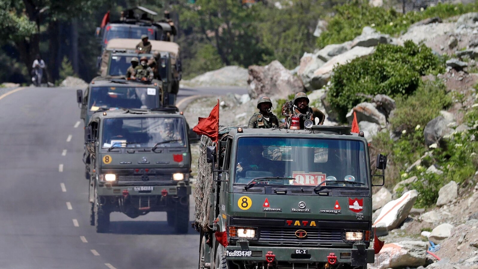 An Indian Army convoy moves along a highway leading to Ladakh, at Gagangeer in Kashmir's Ganderbal district, June 18, 2020.