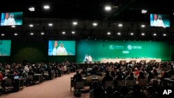 Presiden COP28 Sultan al-Jaber berbicara pada sesi pembukaan KTT Iklim PBB COP28, Kamis, 30 November 2023, di Dubai, Uni Emirat Arab.