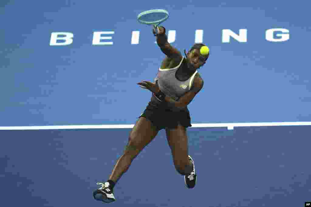 Coco Gauff of the United States returns a shot to Karolina Muchova of Czech Republic during the women&#39;s singles final match at the China Open tennis tournament at the National Tennis Center in Beijing.