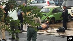 Ahmad Khan Rahami ditangkap setelah terjadi baku tembak dengan polisi, Senin (19/9) di Linden, New Jersey, di barat New York (Moshe Weiss via AP).