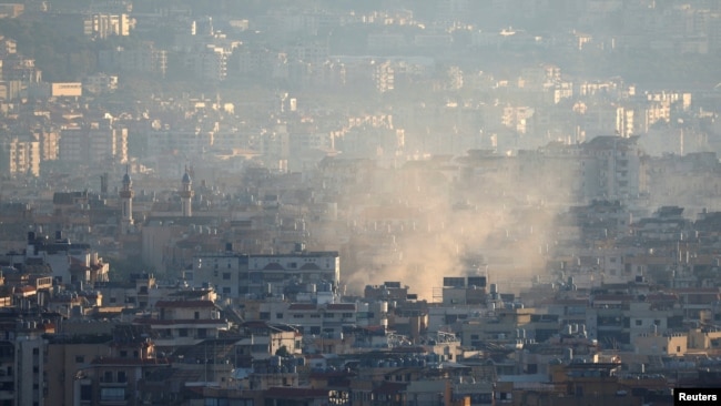 Smoke from an Israeli strike billows from Beirut's southern suburbs, amid the ongoing hostilities between Hezbollah and Israeli forces, in Beirut, Lebanon, Oct. 5, 2024.