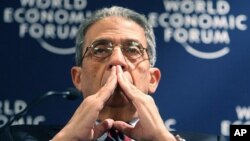 Russia's Sergey Ignashevich fights for the ball with Belgium's Divock Origi during their match at the Maracana stadium in Rio de Janeiro, June 22, 2014.