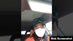 公民记者、前央视主持人李泽华2月26日探访武汉疫区途中疑遭警车尾随。（视频截图）