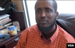 "We have no problem with other communities," Somali store owner Abraham told VOA. "We live side by side, peacefully." (G. Flakus/VOA)