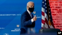 Speaking with CNN's Jake Tapper, president-elect Joe Biden said he would make the request of Americans on Inauguration Day, Jan. 20, to wear masks for 100 days.