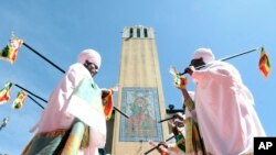 FILE — Ethiopian celebrate Epiphany to mark the baptism of Jesus Christ by John the Baptist, in Addis Ababa, Ethiopia, January 18, 2023. The eve, starting on January 18, people escort the church tabot (replica of the Ark of the Covenant) to a pool, river or artificial reservoir. 