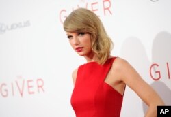 Taylor Swift attends the world premiere of "The Giver" at the Ziegfeld Theater, Aug. 11, 2014, in New York.