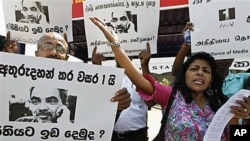 Sri Lankan media rights activists shout slogans during a protest in Colombo, Sri Lanka. Media rights groups' members demanded the government to inquire into the attacks and killings of journalists and punish the culprits, January 18, 2011.