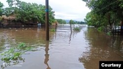 မွန်ပြည်နယ်အတွင်း ရေကြီးရေလျှံနေမှု မြင်ကွင်း။