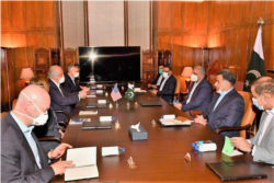 U.S. special representative Zalmay Khalilzad and his delegation meet with Pakistan's army chief Gen. Qamar Javed Bajwa at GHQ in Rawalpindi, Pakistan, Jun 7, 2020. (Courtesy - ISPR)