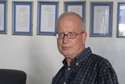 FILE - Al Jazeera bureau chief Lotfi Hajji is pictured inside the National Syndicat headquarters in the Tunisian capital, Tunis, July 26, 2021.