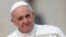 Pope Francis arrives to lead a weekly general audience in Saint Peter's Basilica, at the Vatican, Apr. 3, 2013.