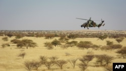 A Tigre helicopter of France's Barkhane mission in central Mali, is seen as the G5 Sahel anti-jihadist force began operations, Nov. 1, 2017.